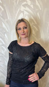 Maglia in pizzo con manicotti