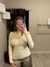 Maglia in pizzo a maniche lunghe