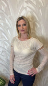 Maglia in pizzo con manicotti