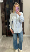 Camicia a righe con cuciture sul punto vita